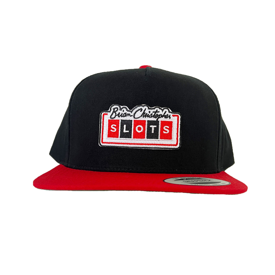 Brian Christopher Slots logo hat with red brim